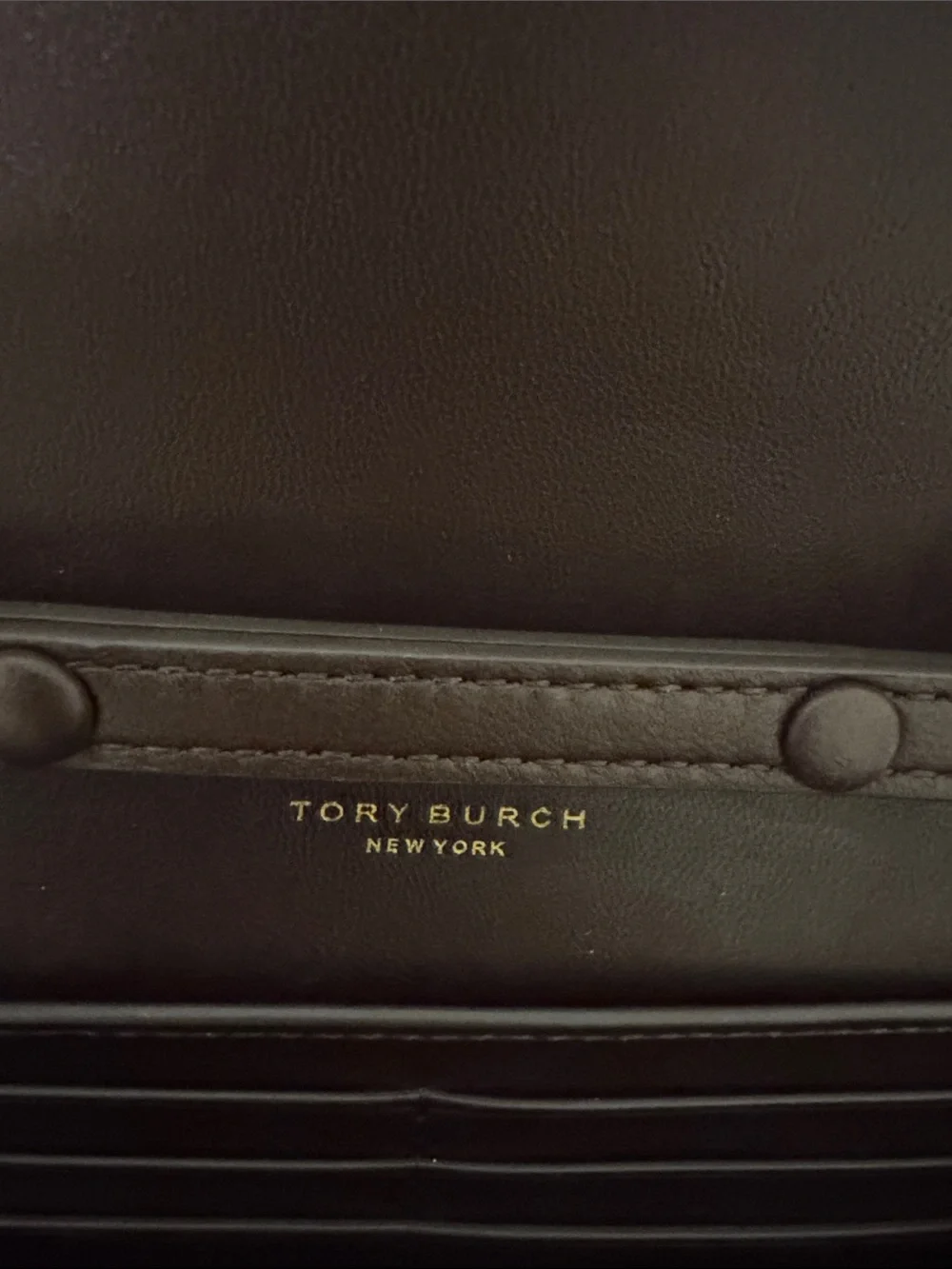 Tory Burch Willa Suede wallet on a chain.